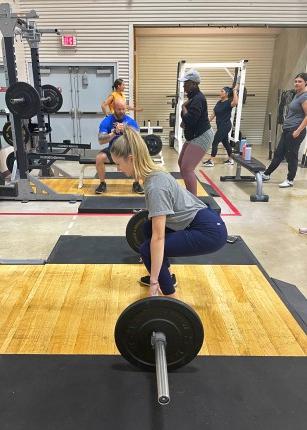 Students in the weight training area of the Finley Recreation Center